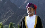 This image made from video shows Oman's new sultan Haitham bin Tariq Al Said, taking part in a cannon-fire salute outside the Royal Family Council in Muscat, Oman, January 11, 2020. (Oman TV via AP)