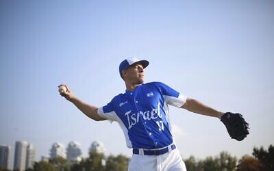 Danny Valencia throws a ball during Israel's national baseball team practice in Tel Aviv, January 14, 2020. (AP Photo/Ariel Schalit)