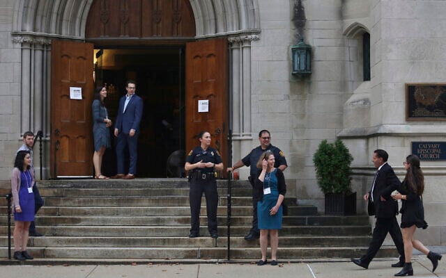 In this September 29, 2019 file photo, members of the Jewish community arrive for services as Pittsburgh Police Detectives provide security on the first night of Rosh Hashana at Calvary Episcopal Church in Pittsburgh. (Rebecca Droke via AP) In this September 29, 2019 file photo, members of the Jewish community arrive for services as Pittsburgh Police Detectives provide security on the first night of Rosh Hashana at Calvary Episcopal Church in Pittsburgh. (Rebecca Droke via AP)