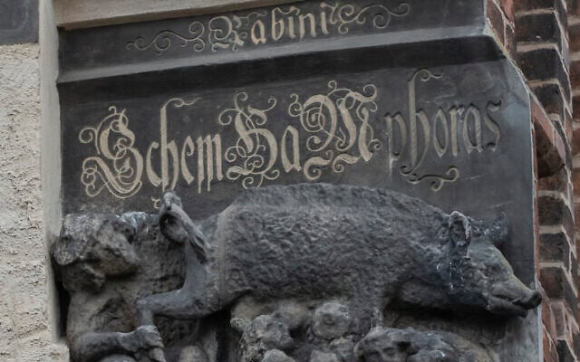 In this January 14, 2020 photo the so-called Judensau, or “Jew pig,” sculpture is displayed on the facade of the Stadtkirche (Town Church) in Wittenberg, Germany. (AP Photo/Jens Meyer) In this January 14, 2020 photo the so-called Judensau, or “Jew pig,” sculpture is displayed on the facade of the Stadtkirche (Town Church) in Wittenberg, Germany. (AP Photo/Jens Meyer)