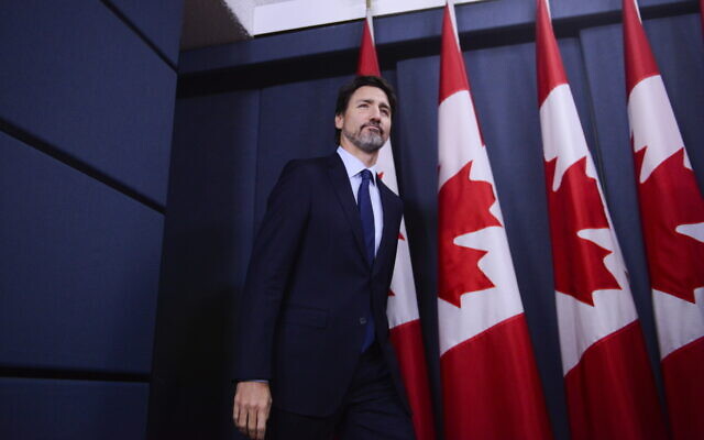 Canada Prime Minister Justin Trudeau arrives at a press conference at the National Press Theatre in Ottawa, January 17, 2020. (Sean Kilpatrick/The Canadian Press via AP) Canada Prime Minister Justin Trudeau arrives at a press conference at the National Press Theatre in Ottawa, January 17, 2020. (Sean Kilpatrick/The Canadian Press via AP)