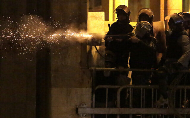Riot police fire rubber bullets against anti-government protesters, during ongoing protests against the political elites who have ruled the country for decades, in Beirut, Lebanon, January 19, 2020. (AP Photo/Hassan Ammar) Riot police fire rubber bullets against anti-government protesters, during ongoing protests against the political elites who have ruled the country for decades, in Beirut, Lebanon, January 19, 2020. (AP Photo/Hassan Ammar)