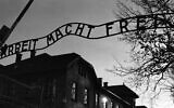 The main entrance at the former Nazi death camp of Auschwitz in Oswiecim, Poland, with the inscription, 'Arbeit Macht Frei', which translates into English as 'Work will set you Free,' December 8, 2019. (Markus Schreiber/AP)