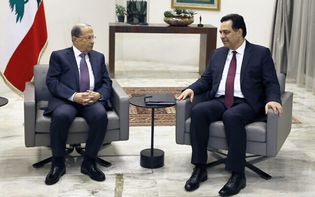 Lebanese President Michel Aoun, left, meets with Prime Minister-Designate Hassan Diab at the Presidential Palace in Baabda, east of Beirut, Lebanon, January 21, 2020. (AP Photo/Bilal Hussein) Lebanese President Michel Aoun, left, meets with Prime Minister-Designate Hassan Diab at the Presidential Palace in Baabda, east of Beirut, Lebanon, January 21, 2020. (AP Photo/Bilal Hussein)
