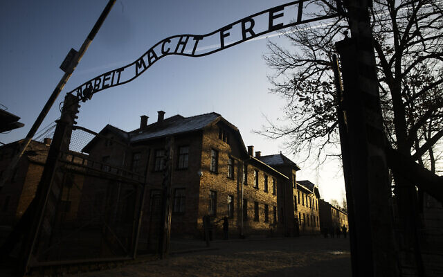 In this December 6, 2019, file photo, the sun lights the buildings behind the entrance of the former Nazi death camp of Auschwitz-Birkenau in Oswiecim, Poland. (Photo/Markus Schreiber, File) In this December 6, 2019, file photo, the sun lights the buildings behind the entrance of the former Nazi death camp of Auschwitz-Birkenau in Oswiecim, Poland. (Photo/Markus Schreiber, File)
