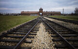 The railway tracks from where hundreds of thousands of people were directed to the gas chambers to be murdered inside the former Nazi death camp of Auschwitz Birkenau or Auschwitz II, in Oswiecim, Poland, on December 7, 2019. (Markus Schreiber/AP/File)