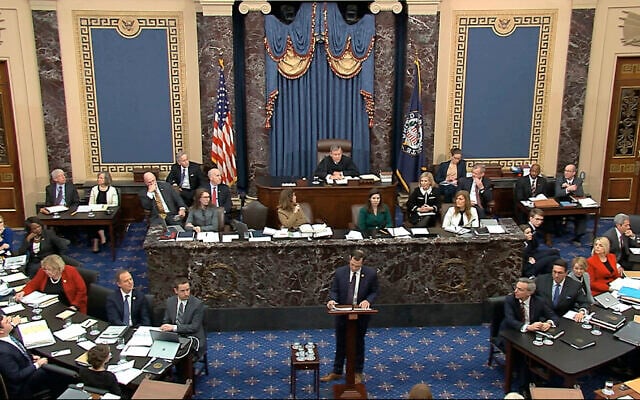 In this image from video, House impeachment manager Rep. Jason Crow, Democrat-Colorado, pauses as he speaks during the impeachment trial against US President Donald Trump in the Senate at the US Capitol in Washington, January 22, 2020. (Senate Television via AP) In this image from video, House impeachment manager Rep. Jason Crow, Democrat-Colorado, pauses as he speaks during the impeachment trial against US President Donald Trump in the Senate at the US Capitol in Washington, January 22, 2020. (Senate Television via AP)