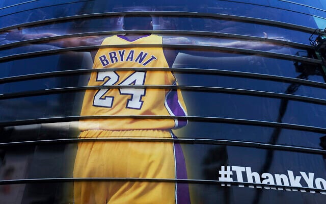 In this April 13, 2016 file photo a giant banner congratulating Kobe Bryant is draped around Staples Center before his last NBA basketball game, a contest against the Utah Jazz, in downtown Los Angeles. Bryant, a five-time NBA champion and a two-time Olympic gold medalist, died in a helicopter crash in California on Sunday, Jan. 26, 2020. He was 41. (AP Photo/Richard Vogel, file) In this April 13, 2016 file photo a giant banner congratulating Kobe Bryant is draped around Staples Center before his last NBA basketball game, a contest against the Utah Jazz, in downtown Los Angeles. Bryant, a five-time NBA champion and a two-time Olympic gold medalist, died in a helicopter crash in California on Sunday, Jan. 26, 2020. He was 41. (AP Photo/Richard Vogel, file)