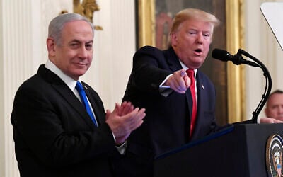 President Donald Trump speaks during an event with Israeli Prime Minister Benjamin Netanyahu in the East Room of the White House in Washington, to announce the Trump administration's much-anticipated plan to resolve the Israeli-Palestinian conflict, Tuesday, Jan. 28, 2020. (AP Photo/Susan Walsh)