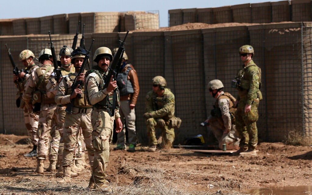 Illustrative: Coalition forces train Iraqi soldiers during a military exercise at Camp Taji, north of Baghdad, Iraq, March 20, 2017. (AP Photo/Hadi Mizban) Illustrative: Coalition forces train Iraqi soldiers during a military exercise at Camp Taji, north of Baghdad, Iraq, March 20, 2017. (AP Photo/Hadi Mizban)