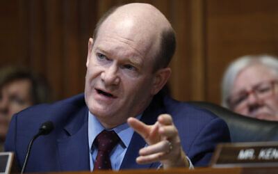 US Sen. Chris Coons questions Treasury Secretary Steve Mnuchin, May 15, 2019, on Capitol Hill in Washington. (AP Photo/Jacquelyn Martin)
