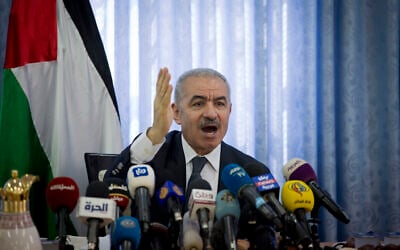 Palestinian Authority Prime Minister Mohammad Shtayyeh, chairs a cabinet meeting in the Jordan Valley village of Fasayil, September 16, 2019. (Majdi Mohammed/AP)