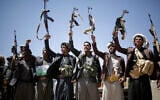 In this September 21, 2019 file photo, Shiite Houthi tribesmen hold their weapons as they chant slogans during a tribal gathering showing support for the Houthi movement, in Sanaa, Yemen. (AP Photo/Hani Mohammed)