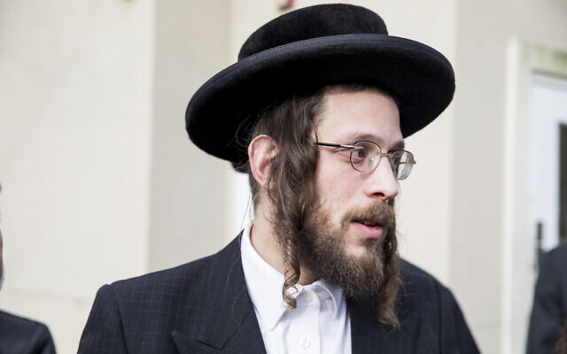 Josef Gluck talks to members of the media about how he obstructed the assailant during a stabbing attack during Hanukkah at a rabbi's home, December 29, 2019, in Monsey, New York. (AP Photo/Julius Constantine Motal) Josef Gluck talks to members of the media about how he obstructed the assailant during a stabbing attack during Hanukkah at a rabbi's home, December 29, 2019, in Monsey, New York. (AP Photo/Julius Constantine Motal)