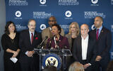 Democratic Representative Yvette Clarke of New York speaks at the Museum of Jewish Heritage, January 2, 2020, in New York. Behind her, from left, are fellow Democratic Rep.s Grace Meng, Eliot Engel, Gregory Meeks, Carolyn Maloney, Max Rose, and Hakeem Jeffries. (AP Photo/Mark Lennihan)