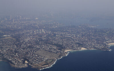 Bushfire smoke shrouds the skyline of Australia's largest city Sydney, Jan. 4, 2020 (AP Photo/Mark Baker)