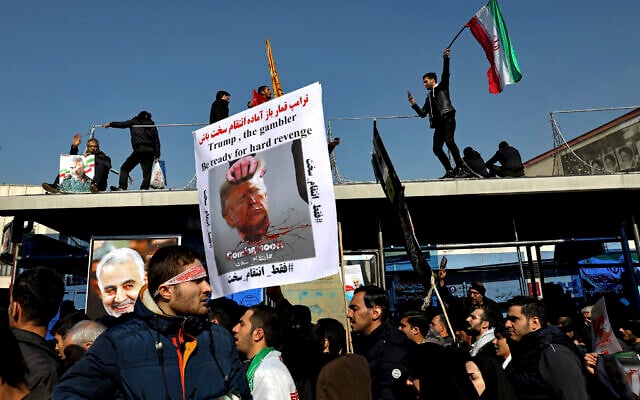 Mourners attend a funeral ceremony for Iranian Gen. Qassem Soleimani and his comrades, who were killed in Iraq in a US drone strike, at the Enqelab-e-Eslami (Islamic Revolution) square in Tehran, Iran, January 6, 2020. (Ebrahim Noroozi/AP) Mourners attend a funeral ceremony for Iranian Gen. Qassem Soleimani and his comrades, who were killed in Iraq in a US drone strike, at the Enqelab-e-Eslami (Islamic Revolution) square in Tehran, Iran, January 6, 2020. (Ebrahim Noroozi/AP)
