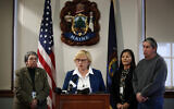 Maine Gov. Janet Mills speaks to reporters before signing papers to posthumously pardon Don Gellers, a Passamaquoddy tribal lawyer convicted of marijuana possession, at the Statehouse in Augusta, Maine, January 7, 2020. (Robert F. Bukaty/AP)