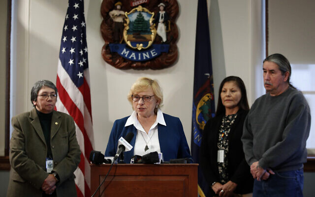 Maine Gov. Janet Mills speaks to reporters before signing papers to posthumously pardon Don Gellers, a Passamaquoddy tribal lawyer convicted of marijuana possession, Tuesday, Jan. 7, 2020 at the Statehouse in Augusta, Maine. Accompanying the governor, from left, is Donna Loring, the governor's senior adviser on tribal affairs, Tribal Rep. Rena Newell, and Darrell Newell, Vice Chief of the Passamaquoddy Indian Township. (AP Photo/Robert F. Bukaty) Maine Gov. Janet Mills speaks to reporters before signing papers to posthumously pardon Don Gellers, a Passamaquoddy tribal lawyer convicted of marijuana possession, Tuesday, Jan. 7, 2020 at the Statehouse in Augusta, Maine. Accompanying the governor, from left, is Donna Loring, the governor's senior adviser on tribal affairs, Tribal Rep. Rena Newell, and Darrell Newell, Vice Chief of the Passamaquoddy Indian Township. (AP Photo/Robert F. Bukaty)