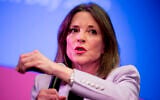 Marianne Williamson speaks at a the Faith, Politics and the Common Good Forum at Franklin Jr. High School, January 9, 2020, in Des Moines, Iowa. (AP Photo/Andrew Harnik)