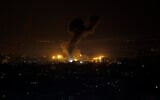 An explosion caused by Israeli airstrikes is seen on Gaza City, Wednesday, Jan. 15, 2020. (AP/Adel Hana)