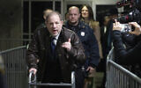 Harvey Weinstein gestures as he walks by reporters as he leaves a Manhattan courtroom after attending jury selection for his trial on rape and sexual assault charges, January 17, 2020 in New York. (AP Photo/Mark Lennihan)