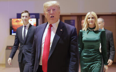 US President Donald Trump, Ivanka Trump and Jared Kushner, left, leave after attending a session at the World Economic Forum in Davos, Switzerland, January 21, 2020. (AP Photo/Markus Schreiber)
