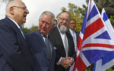 Britain's Prince Charles, center, meets with President Reuven Rivlin, left, and Chief Rabbi Ephraim Mirvis at his official residence in Jerusalem, Jan. 23, 2020 (Victoria Jones/Pool via AP)