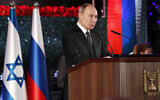 Russian President Vladimir Putin delivers a speech at the inauguration of the Memorial Candle monument in Jerusalem on January 23, 2020 commemorating the people of Leningrad during a WWII Nazi siege on the city. (Emmanuel Dunad, Pool via AP)