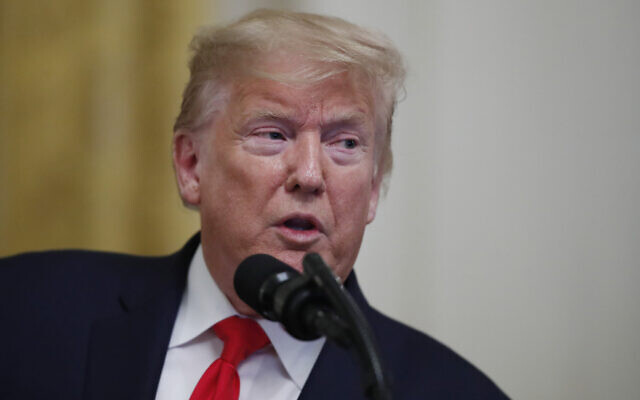 US President Donald Trump speaks to a bipartisan group of the Nation's mayors in the East Room of the White House, in Washington, January 24, 2020. (Alex Brandon/AP) US President Donald Trump speaks to a bipartisan group of the Nation's mayors in the East Room of the White House, in Washington, January 24, 2020. (Alex Brandon/AP)