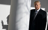 US President Donald Trump walks to a meeting in the Oval Office of the White House with Prime Minister Benjamin Netanyahu (not pictured), Jan. 27, 2020, in Washington. (AP Photo/ Evan Vucci)