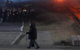 Holocaust survivor Marian Turski, center, walks to meet dignitaries, rear left, during commemorations at the Auschwitz Nazi death camp in Oswiecim, Poland, January 27, 2020. (AP Photo/Czarek Sokolowski)