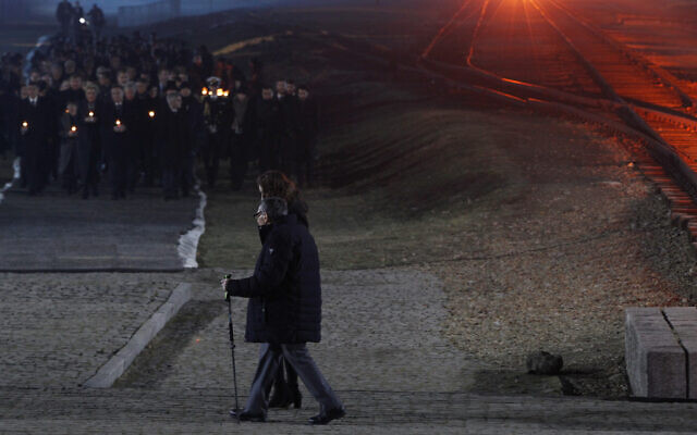 Holocaust survivor Marian Turski, center, walks to meet dignitaries, rear left, during commemorations at the Auschwitz Nazi death camp in Oswiecim, Poland, January 27, 2020. (AP Photo/Czarek Sokolowski) Holocaust survivor Marian Turski, center, walks to meet dignitaries, rear left, during commemorations at the Auschwitz Nazi death camp in Oswiecim, Poland, January 27, 2020. (AP Photo/Czarek Sokolowski)