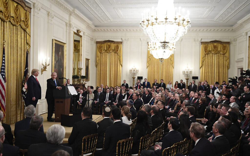 Prime Minister Benjamin Netanyahu speaks with US President Donald Trump during an event with in the East Room of the White House in Washington on January 28, 2020. (AP/Susan Walsh) Prime Minister Benjamin Netanyahu speaks with US President Donald Trump during an event with in the East Room of the White House in Washington on January 28, 2020. (AP/Susan Walsh)