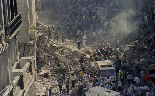 Firemen and rescue workers walk through the debris after a terrorist attack on Israel's embassy in Buenos Aires, Argentina, on March 17, 1992. (Don Rypka/AP) Firemen and rescue workers walk through the debris after a terrorist attack on Israel's embassy in Buenos Aires, Argentina, on March 17, 1992. (Don Rypka/AP)