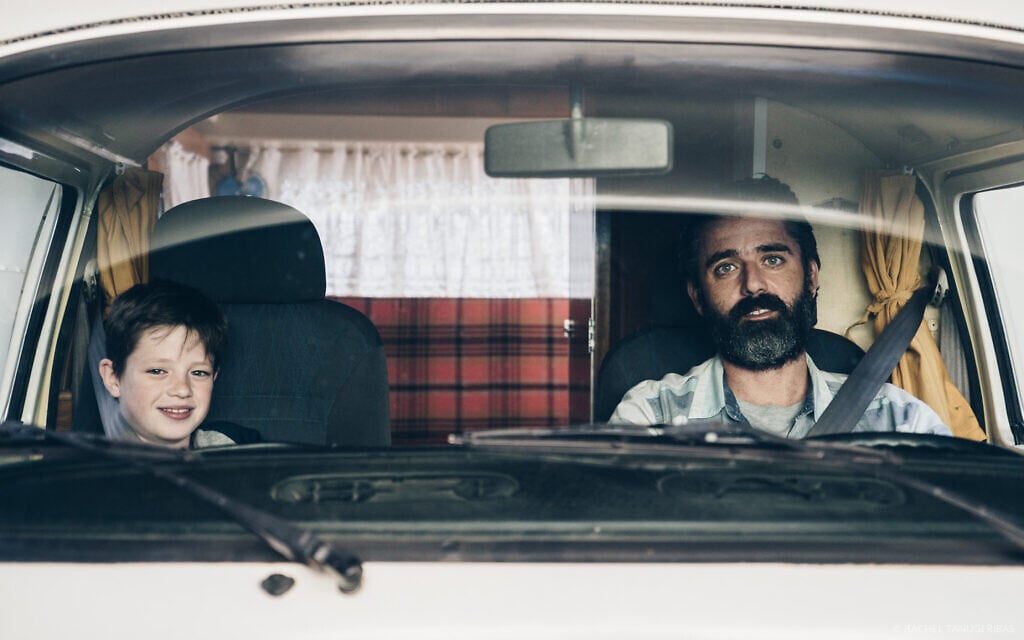 In this still from the 2018 film 'Back to Maracana,' Itai, played byRom Barnea speaks with his father, Roberto, played by Asaf Goldstien. (Courtesy)