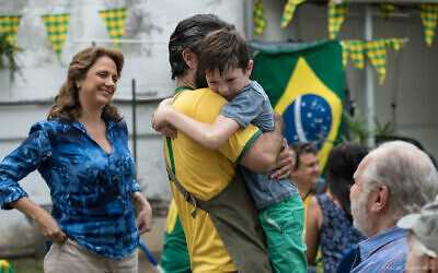 In this still from the 2018 film 'Back to Maracana,' some long overdue bonding takes place between Brazilian-Israeli father Roberto (Asaf Goldstien) and his son Itai (Rom Barnea). (Courtesy)