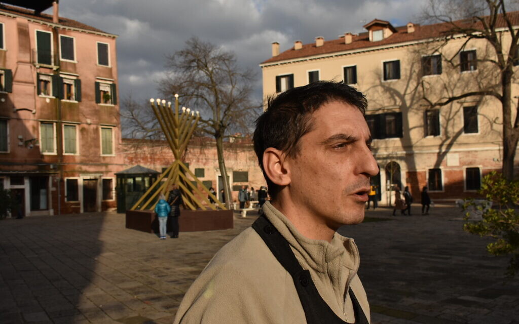 Fabio Penazzo, a hotel manager in Venice's Jewish ghetto, says God helped keep the damage to a minimum in record-setting flooding last November. Photo taken on December 28, 2019. (Giovanni Vigna/ Times of Israel)