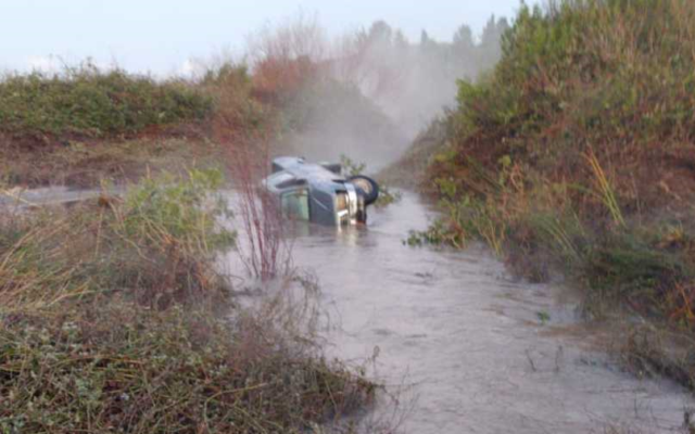 A car that was swept away in floods at the Dalia Stream in northern Israel on January 5, 2020, and found January 6 next to the driver's body. (Israel Police) A car that was swept away in floods at the Dalia Stream in northern Israel on January 5, 2020, and found January 6 next to the driver's body. (Israel Police)