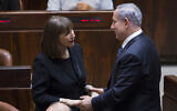Then Sports and Culture Minister Limor Livnat (left) talks to Prime Minister Benjamin Netanyahu during a vote on a bill to dissolve the parliament in the Knesset, Jerusalem, on December 8, 2014 (Yonatan Sindel/Flash90)
