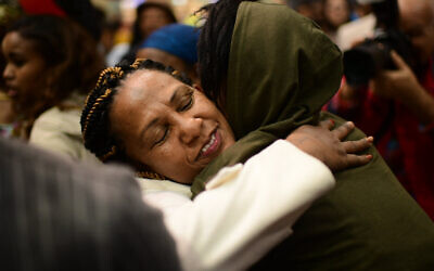 Members of the Falash Mura community reunite with their families at the Ben Gurion airport, outside Tel Aviv on February 4, 2019. (Tomer Neuberg/Flash90)
