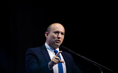 Defense Minister Naftali Bennett speaks during the Makor Rishon conference at the International Convention Center in Jerusalem, December 8, 2019. (Yonatan Sindel/Flash90)
