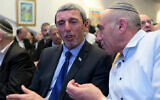 Rafi Peretz, left, and MK Moti Yogev attend a meeting of the Jewish Home party in Tel Aviv on Jan 13, 2020. (Gili Yaari / Flash90)