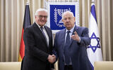 President Reuven Rivlin shakes hands with German President Frank-Walter Steinmeier (L) at the President's Residence in Jerusalem on January 22, 2020. (Hadas Parush/Flash90)