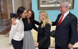 Naama Isaachar (left) is greeted by Sara Netanyahu while her mother Yaffa (second left) and Prime Minister Benjamin Netanayhu look on at the Moscow airport, January 30, 2020 (GPO)