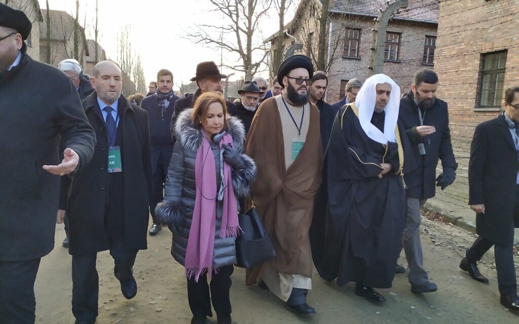 Interfaith delegation to Auschwitz including Muslim World League head Mohammed al-Issa, center-right with white head covering, January 23, 2020. (Yaakov Schwartz/ Times of Israel)