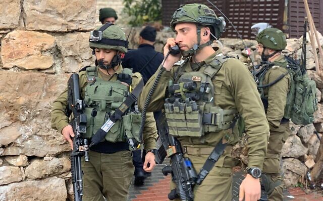 IDF forces on the scene of a stabbing attack near the West Bank settlement of Kiryat Arba on January 18, 2020. (IDF Spokesperson's Office) IDF forces on the scene of a stabbing attack near the West Bank settlement of Kiryat Arba on January 18, 2020. (IDF Spokesperson's Office)