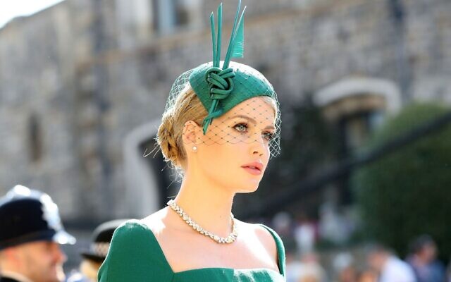 Lady Kitty Spencer arrives foir the wedding ceremony of her first cousin, Britain's Prince Harry, to US actress Meghan Markle, at Windsor Castle on May 19, 2018. (Gareth Fuller/AFPs) Lady Kitty Spencer arrives foir the wedding ceremony of her first cousin, Britain's Prince Harry, to US actress Meghan Markle, at Windsor Castle on May 19, 2018. (Gareth Fuller/AFPs)