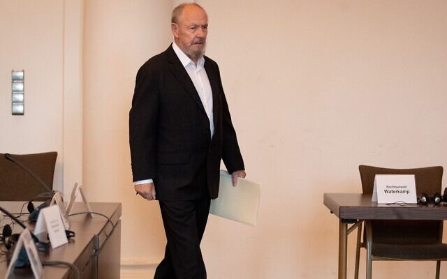 Peter Loth enters a Hamburg, Germany, courtroom for the trial of Bruno Dey, a guard at the Stutthof Nazi concentration camp, Nov. 12, 2019. (Christian Charisius/Pool/AFP) Peter Loth enters a Hamburg, Germany, courtroom for the trial of Bruno Dey, a guard at the Stutthof Nazi concentration camp, Nov. 12, 2019. (Christian Charisius/Pool/AFP)