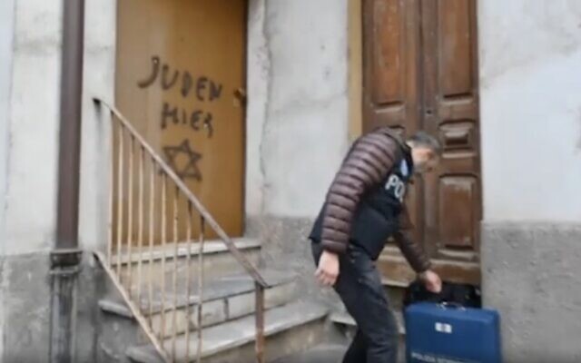 "Juden Hier," German for "Jews Here," is seen spray-painted on the door of the home of the late Holocaust survivor Lidia Beccaria Rolfi, on January 24, 2019, in Mondovi, northern Italy. (Screen capture: Repubblica Torino) "Juden Hier," German for "Jews Here," is seen spray-painted on the door of the home of the late Holocaust survivor Lidia Beccaria Rolfi, on January 24, 2019, in Mondovi, northern Italy. (Screen capture: Repubblica Torino)